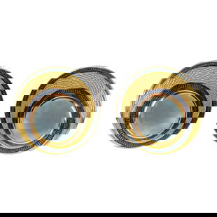 Leo de Vroomen (b. 1941) Pair of 18K Gold and Enamel Ear Clips: Leo de Vroomen (b. 1941) Pair of 18K Gold and Enamel Ear Clips, each centered by a luminous cabochon moonstone, within concentric rings of glossy enamel and finely textured 18-karat yellow gold in