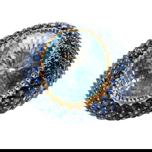 18 Karat Yellow Gold, Aquamarine, Sapphire, and Diamond Ring: 18 Karat Yellow Gold, Aquamarine, Sapphire, and Diamond Ring A striking 18 karat yellow gold dome ring centering an oval-cut aquamarine weighing approximately 10.00 carats, bezel-set within a richly