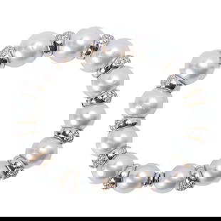 18 Karat White Gold, Cultured Pearl and Diamond Bracelet: 18 Karat White Gold, Cultured Pearl and Diamond Bracelet Composed of thirteen fine cultured pearls, each measuring approximately 13 mm, interspaced with twelve pavé-set diamond rondelle spacers,