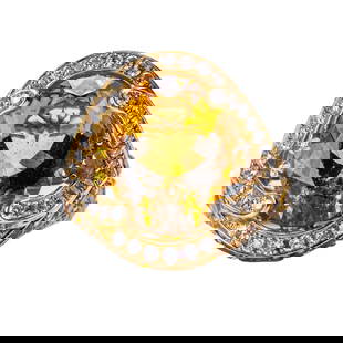 18 Karat Gold, Citrine, Yellow Sapphire, and Diamond Ring: 18 Karat Gold, Citrine, Yellow Sapphire, and Diamond Ring Boldly designed, circa late 20th century. Centering an oval mixed-cut citrine, weighing approximately 15–18 carats, surrounded by a halo of