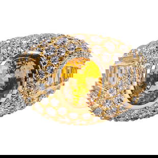 18 Karat Gold, Yellow Sapphire and Diamond Ring: 18 Karat Yellow Gold, Yellow Sapphire and Diamond Ring Centering an oval mixed-cut yellow sapphire weighing approximately 7.50 carats, framed by pavé-set round brilliant-cut diamonds and accented by