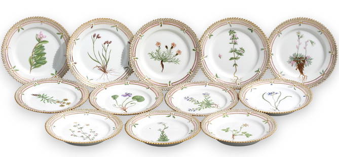Set of Twelve Royal Copenhagen Flora Danica Porcelain Bread & Butter Plates: Set of Twelve Royal Copenhagen Flora Danica Porcelain Bread & Butter Plates Number 3552, 5.5 in. diameter., marked Royal Copenhagen, with painters marks and identifying flower title. Molded with gilt