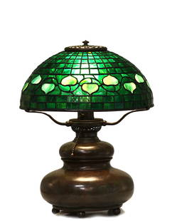 Tiffany Studios "Vine Border" Table Lamp: Tiffany Studios "Vine Border" Table Lamp Circa 1905 A fine early Tiffany Studios leaded glass and patinated bronze table lamp, model "Vine Border," originally designed for kerosene illumination and