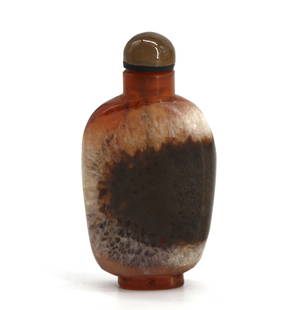 Chinese Crystalized Varied Brown and White Colored Mineral Snuff Bottle: Chinese CrystalizedVaried Brown and White Colored Mineral Snuff Bottle The tapered ovoid footed body with a conforming domed cap and a scoop. 2.75 in. Snuff bottles were personal objects of