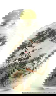 Chinese Reverse Painting on Glass Snuff Bottle: Chinese Reverse Painting on Glass Snuff Bottle Of elongated ovoid form, one side painted with two cranes atop a rock with pines, the reverse with a Chinese pheasant, with a green serpentine cap and a