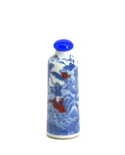 Chinese Blue and White Decorated Porcelain Snuff Bottle: Chinese Blue and White Decorated Porcelain Snuff Bottle Of cylindrical form, decorated with a fisherman in a lake landscape with mountains in the distance, with iron red highlights, blue glass cap.