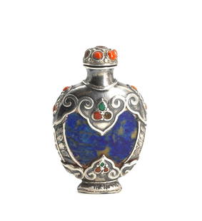 Good Sino-Tibetan Silvered Metal Mounted Sodalite Snuff Bottle: Good Sino-Tibetan Silvered Metal Mounted Sodalite Snuff Bottle The heart shaped lapis body overlaid with a framework of thick silvered metal cast with scrolls, further decorated with malachite and