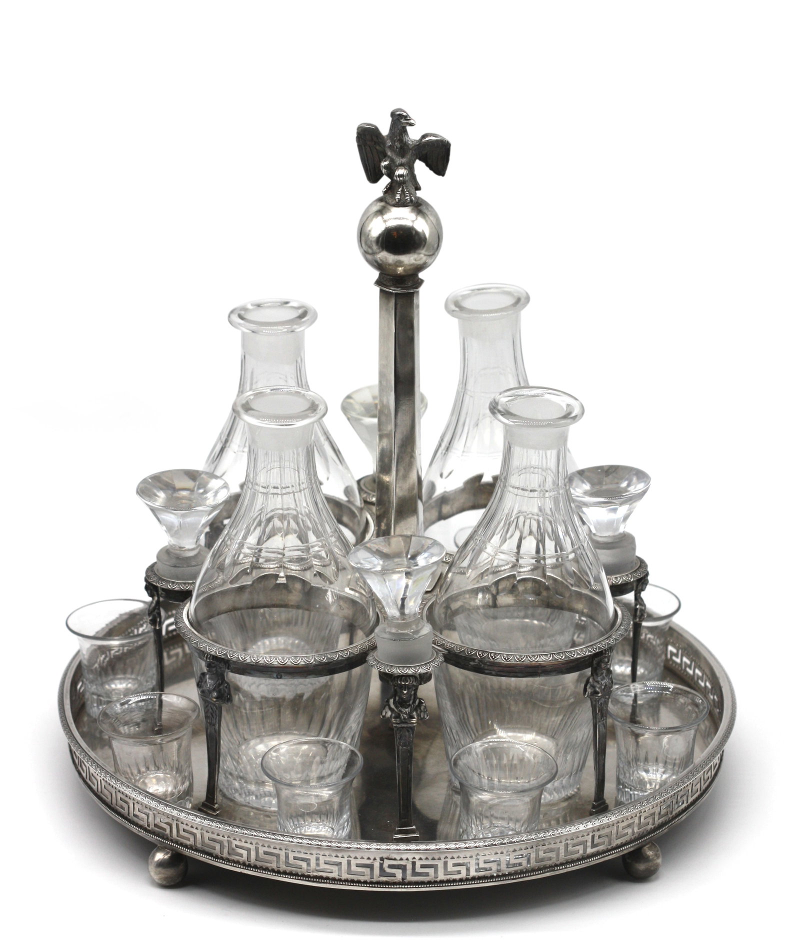 French Empire Silver Decanter Stand, Maker Louis Joseph-Bouty, 1794-1809: French Empire Silver Decanter Stand, Maker Louis Joseph-Bouty, 1794-1809. French hallmarks. Fitted with four cut-glass bottles with stoppers and eight loose cut-glass shot glasses, (bottles and