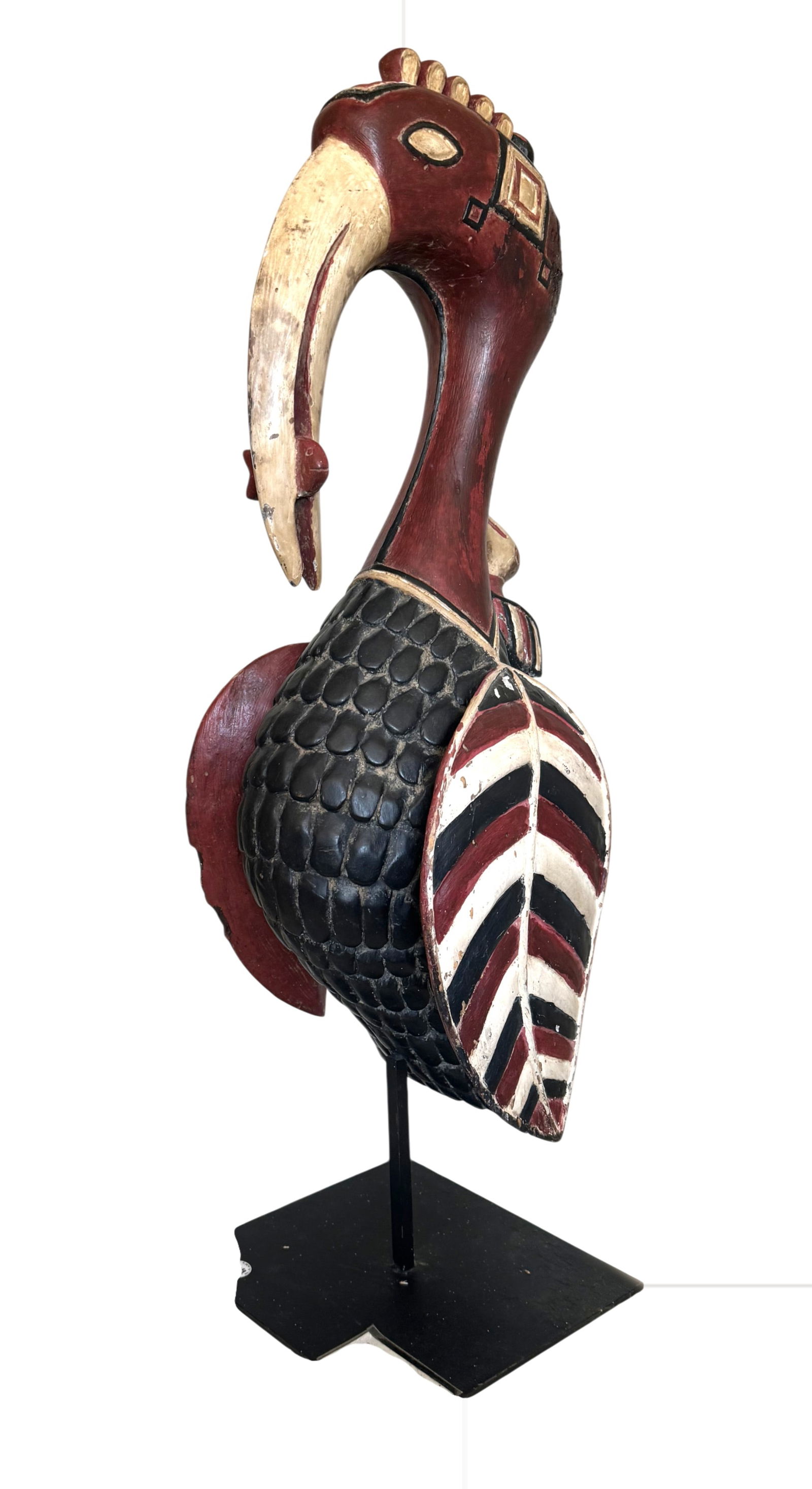 Baga Peoples Sino Society Bird Totem, Guinea: Baga Peoples Sino Society Bird Totem, Guinea polychrome painted in the form of a bird. Height 32 in., Width 11 in., Depth 12 in., Height overall, with stand 37 in.