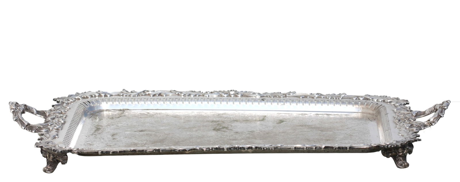 Rogers Brothers Silverplate Tea Tray: Rogers Brothers Silverplate Tea Tray Marked R & B with a Crown. The rectangular two-handled tray with ab pierced inner border and an outer border heavily chased with scrolls and leaves, the recess