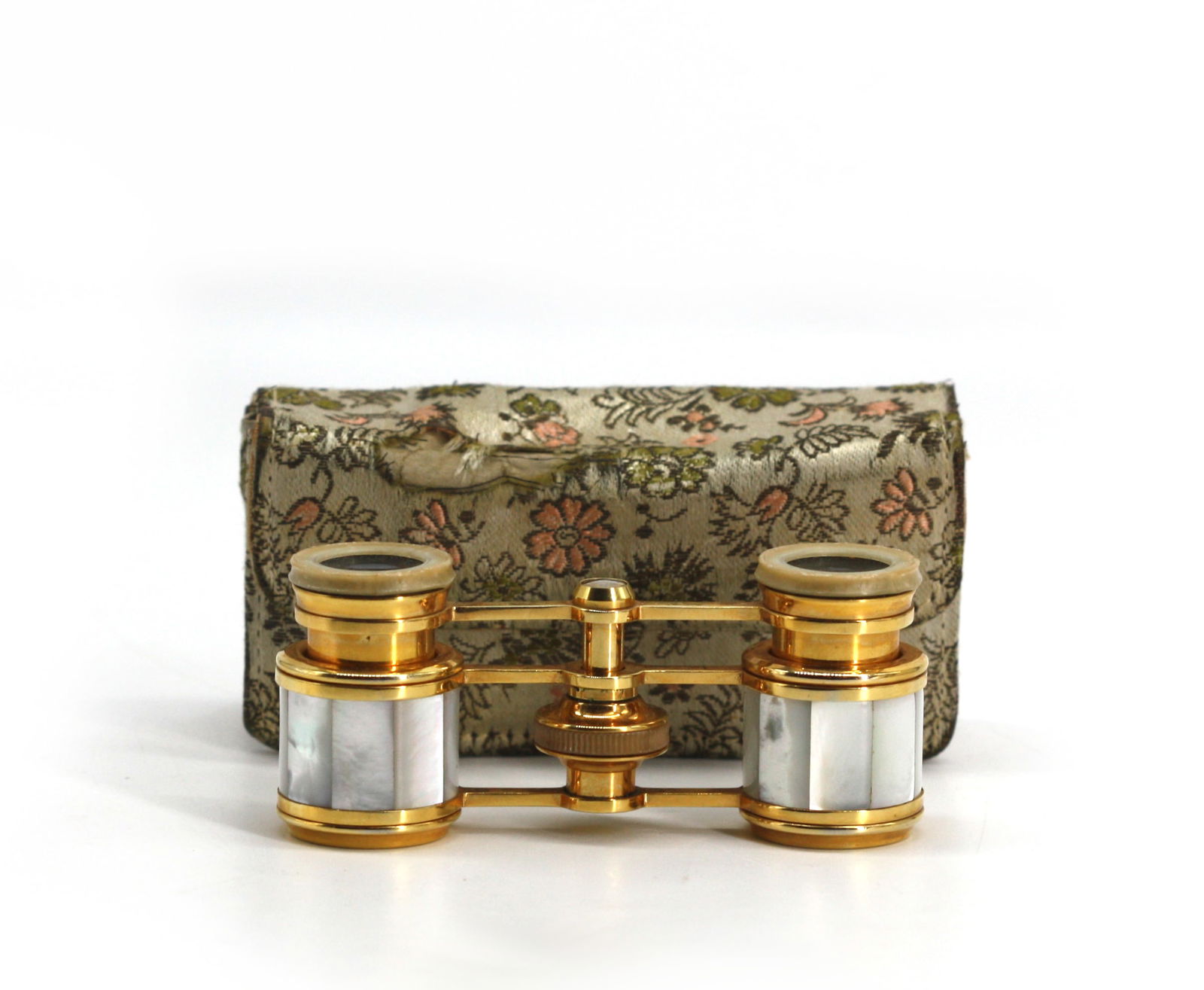 French Gilt Metal and Mother of Pearl Opera Glasses: French Gilt Metal and Mother of Pearl Opera Glasses Engraved and retailed by Neiman Marcus, in an embroidered silk case. Length 4 in.