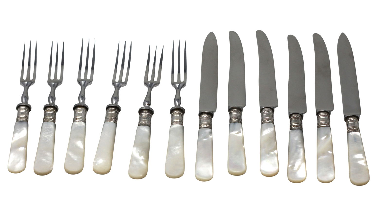 Sheffield Mother-of-Pearl, Silver and Silverplate Fruit Service: Sheffield Mother-of-Pearl, Silver and Silverplate Fruit Service The collars marked sterling. Comprising six knives and six forks. Length of knives 6.25 in.