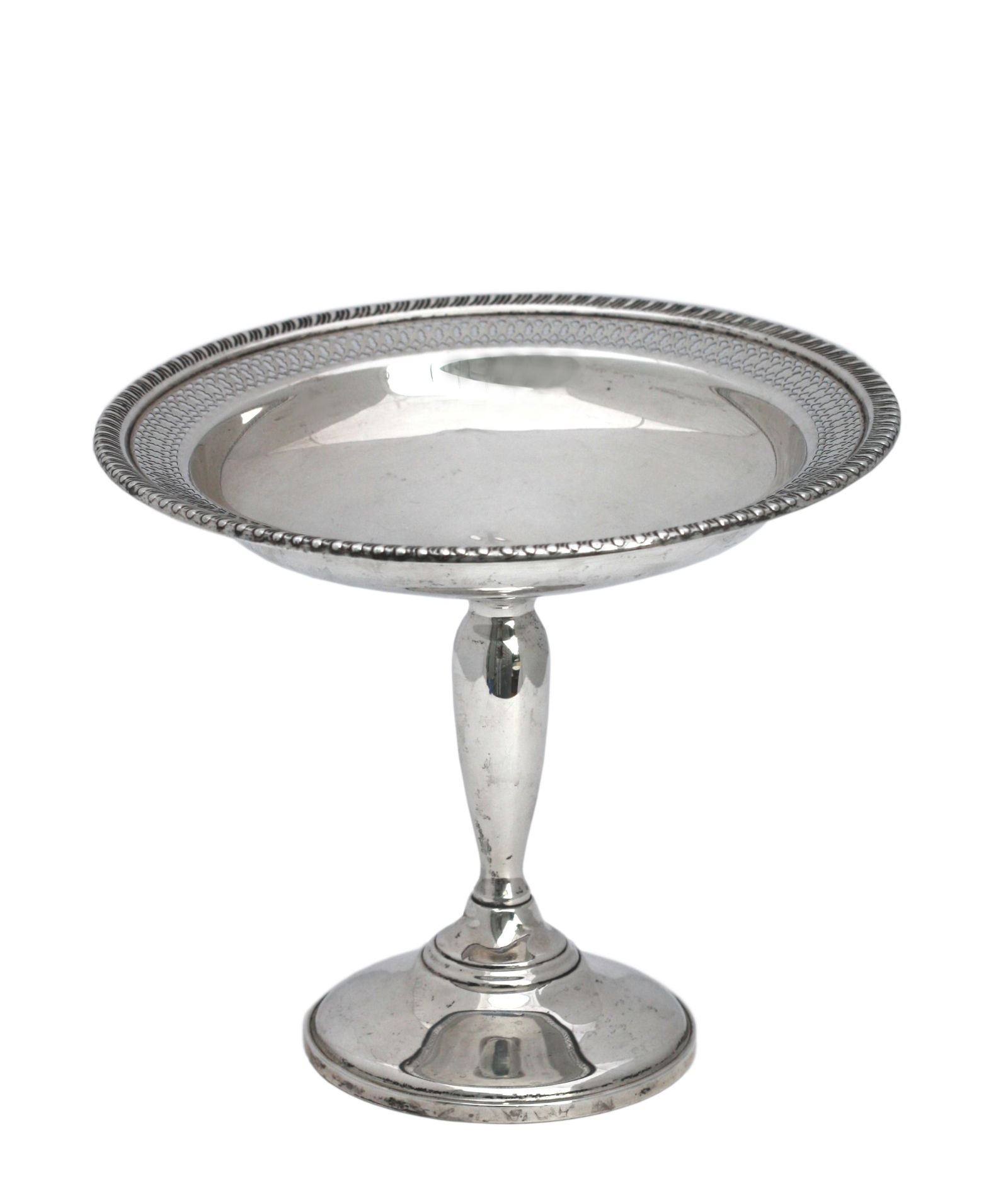 American Sterling Silver Tazza: American Sterling Silver Tazza Marked Sterling 1668. Of classic circular form, the die-stamped bowl with gadrooned rim and trellis-pierced border, raised on a tapered stem terminating in a circular