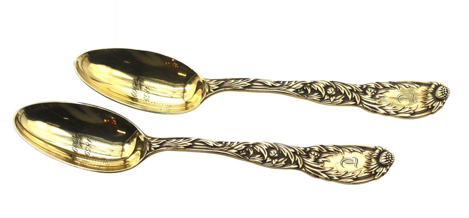 Pair of Tiffany & Co. Chrysanthemum Gilt Sterling Silver Spoons: Pair of Tiffany & Co. Chrysanthemum Gilt Sterling Silver Spoons Circa 1890, each marked sterling, Tiffany & Co., Pat. 1X80.M, the scoops incised 1859-1909, the handles with a monogramed D and cast