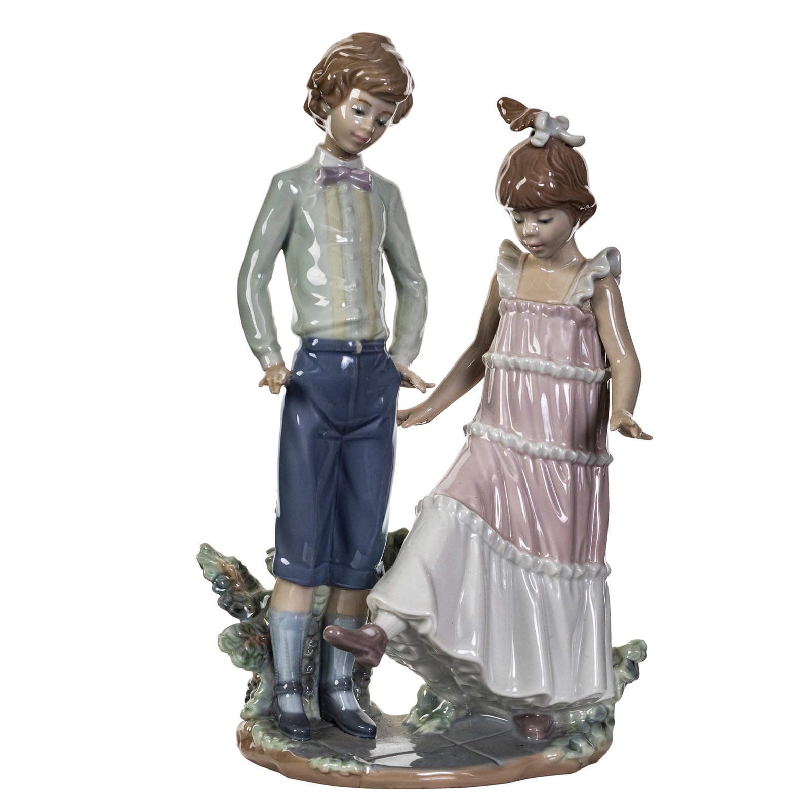 Lladro Porcelain Figural Group of a Boy and Girl.: Lladro Porcelain Figural Group of a Boy and Girl. Marked Lladro, impressed 5426. Height 10.75 in., Width 7 in., Depth 4 in.