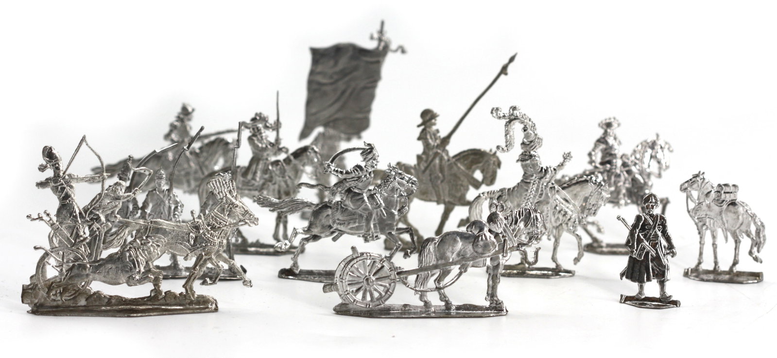 Large Group of British/French Stamped Lead Toy Soldiers: Large Group of British/French Stamped Lead Toy Soldiers 20th Century. Unpainted, some with markings, depicting various historical periods and countries. (lot, in excess of 200 pieces) Approx. Heights 