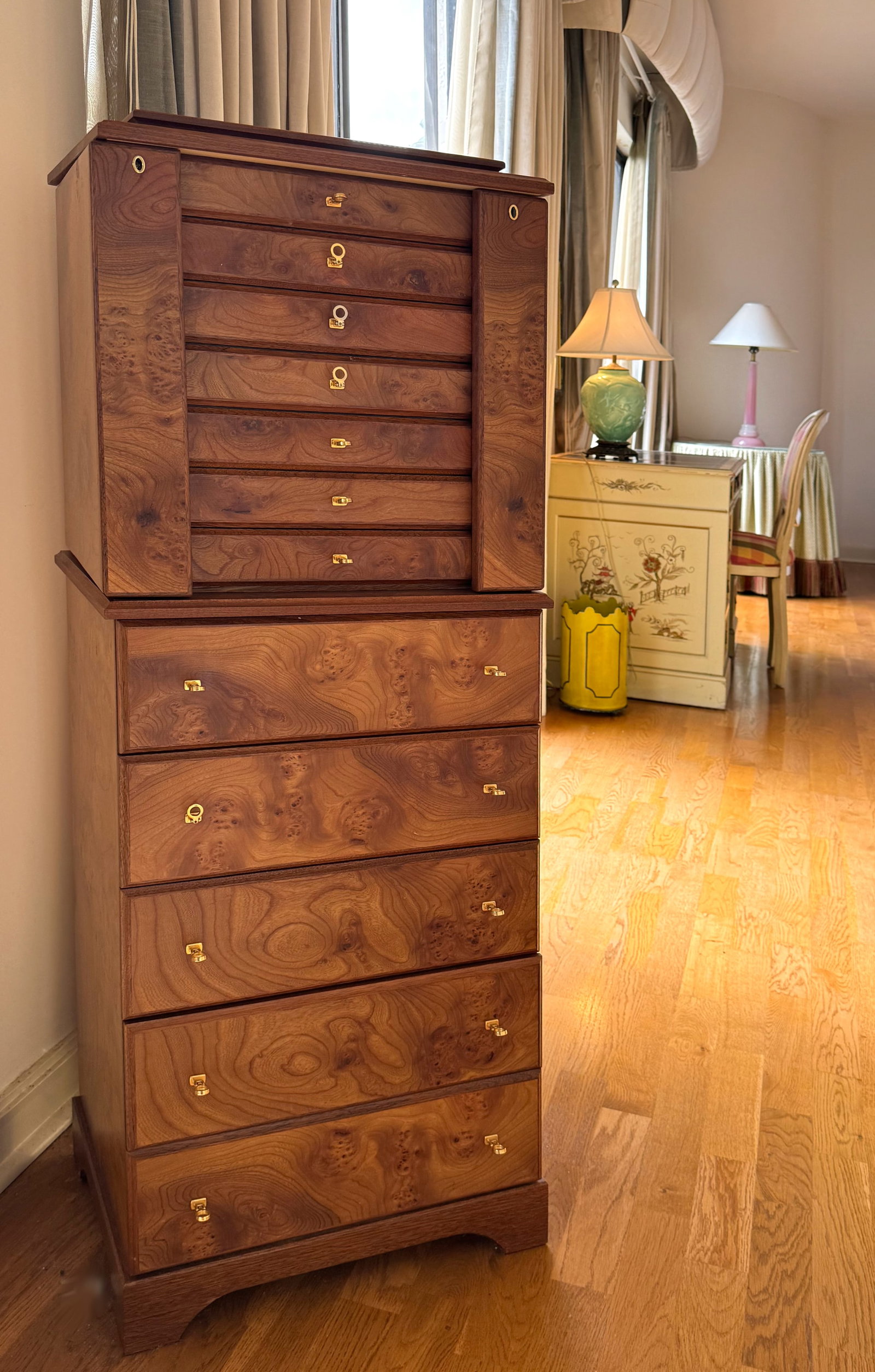 Contemporary Burlwood Jewelry Cabinet: Contemporary Burlwood Jewelry Cabinet The sides of the upper part hinged and opening to hanging storage, fitted with numerous small compartmentalized drawers. Height 48 in., Width 19.5 in., Depth 13.5
