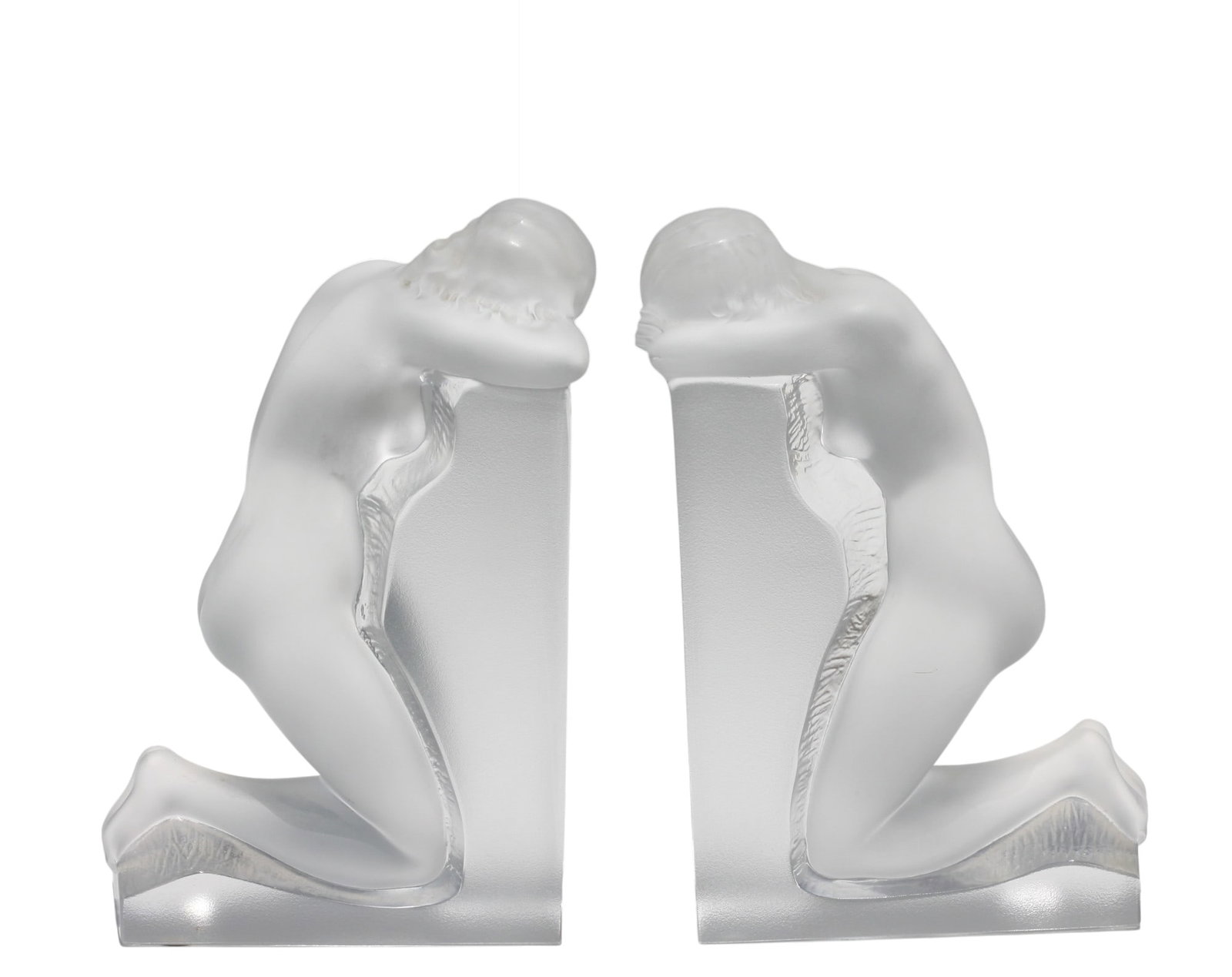 Pair of Lalique France Reverie Frosted Glass Figural Bookends: Pair of Lalique France Reverie Frosted Glass Figural Bookends Signed Lalique France, also with a paper label. Each in the form of a female nude. Height 8.75 in., Width 3.25 in., Depth 5.75 in.