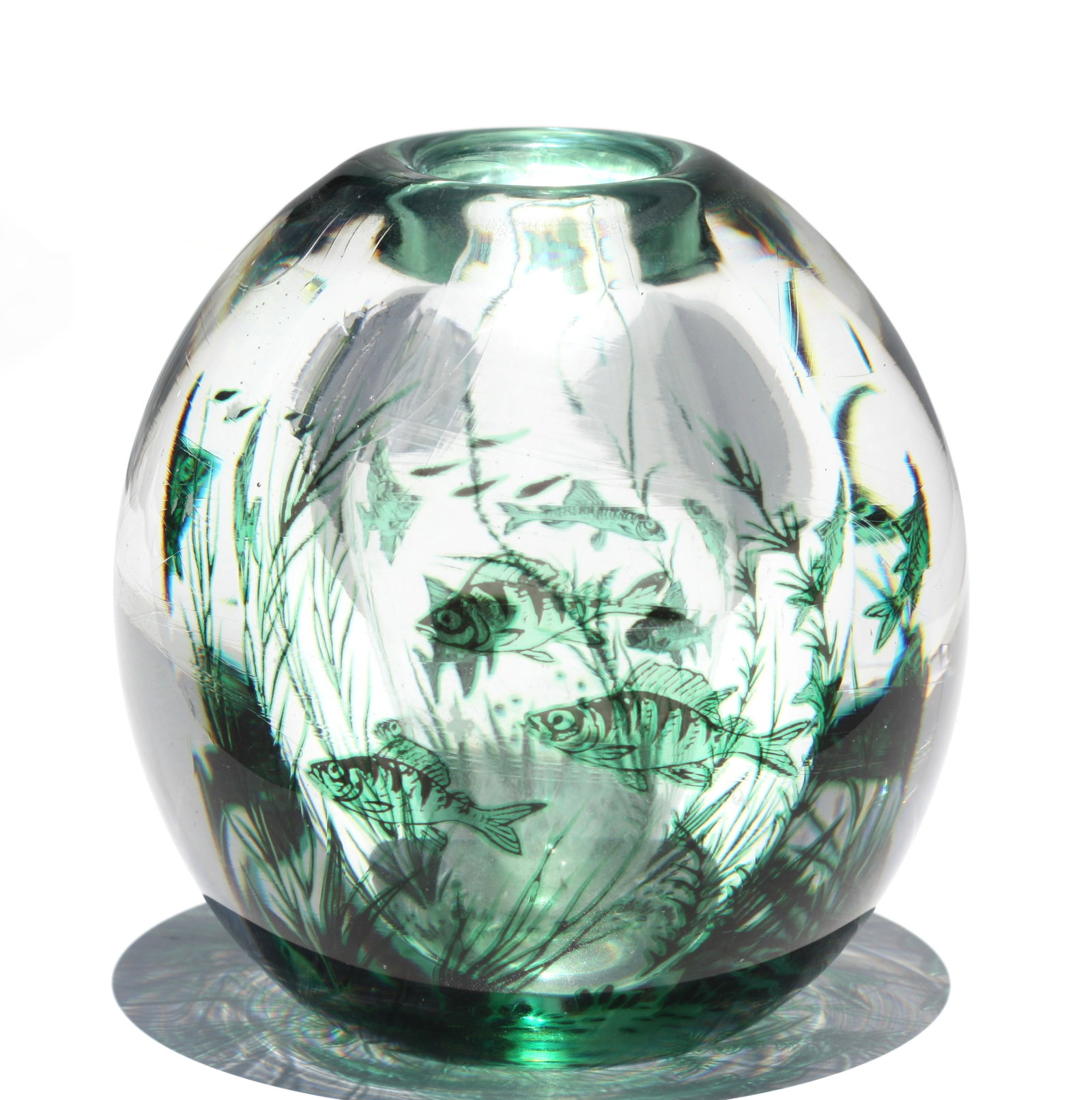 Orrefores Green and Colorless Glass Fishbowl Vase: Orrefores Green and Colorless Glass Fishbowl Vase signed on the underside. Decorated with green, outlined in black, fish and water foliage. Height 6 in., Diameter at mid body 5.5 in.
