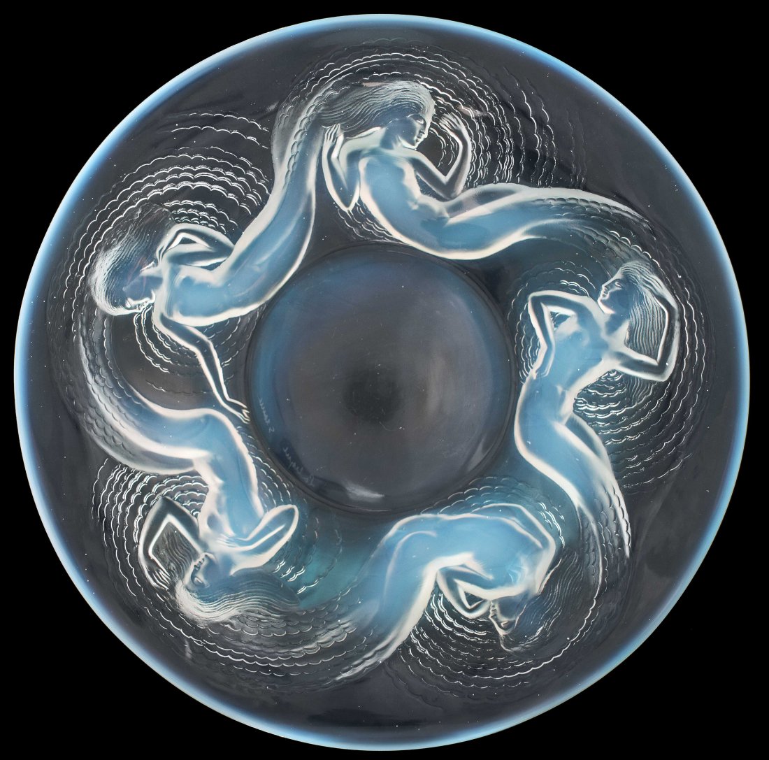 RENE LALIQUE "CALYPSO" PLATE, circa 1930: PROPERTY OF A FLORIDA COLLECTION RENE LALIQUE MOLDED OPALESCENT GLASS "CALYPSO" PLATE Model introduced 1930. Signed Lalique France. Diameter 14 1/2 inches. Literature: R. Lalique Catalogue Raisonne by
