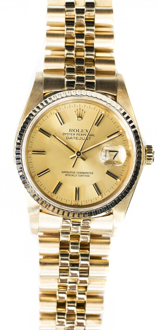 ROLEX DATEJUST 18K YELLOW GOLD WRISTWATCH: ROLEX DATEJUST 18K YELLOW GOLD WRISTWATCH Swiss, automatic mechanical movement, champagne dial with stick indicators, Dial, case and movement signed Rolex. Bracelet stamped 18K Rolex. Diameter 37mm.