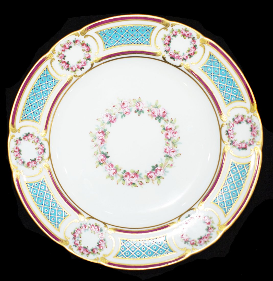 SET TWELVE MINTON PORCELAIN DINNER PLATES: PROPERTY OF A DELRAY BEACH GENTLEMAN SET TWLEVE MINTON 'ROSE BOUQUET' PORCELAIN DINNER PLATES Some bearing retailers marks for T. Goode & Company, London. Decorated with wreaths of roses alternating w