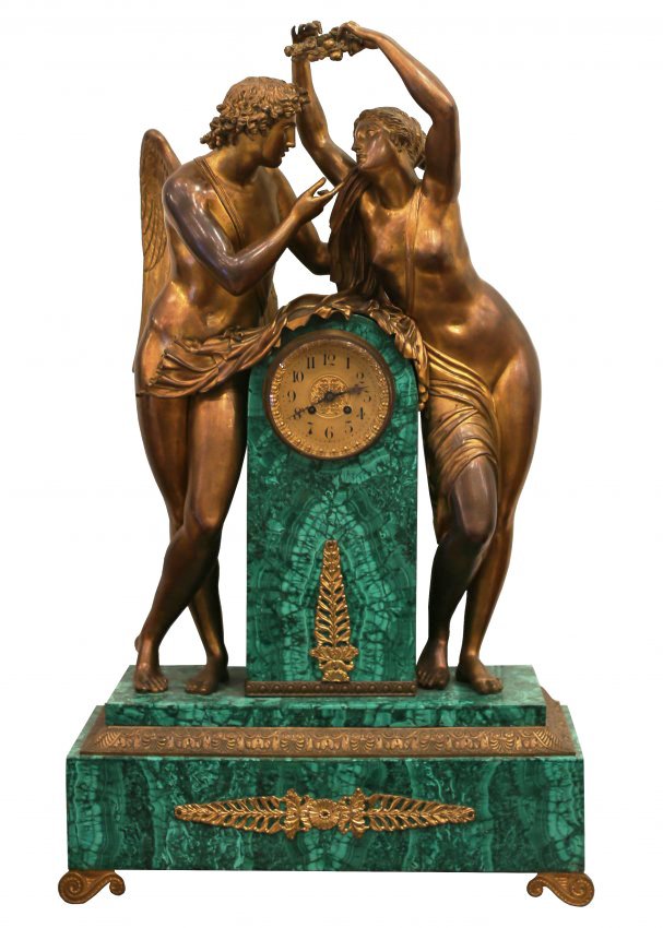 FRENCH GILT-BRONZE MOUNTED MALACHITE MANTEL CLOCK: FRENCH GILT-BRONZE MOUNTED MALACHITE MANTEL CLOCK 19th Century. After a design by Claude Michallon (1751-1799) Centered by a column supporting a circular dial and movement, flanked by Cupid and Psyche