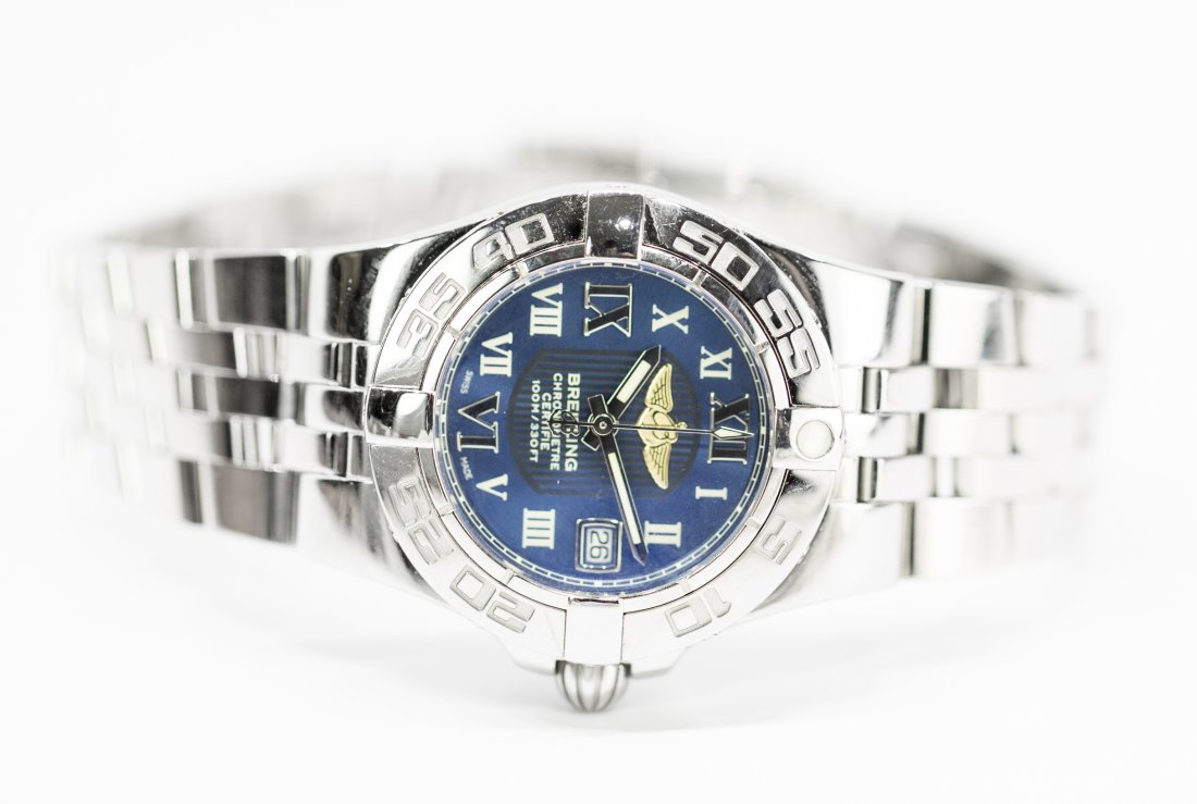BREITLING SS DATE GALACTIC 30 WRISTWATCH: BREITLING SS DATE GALACTIC 30 WRISTWATCH Swiss. Quartz Movement - Chronometer. Dial, case and and strap signed BREITLING. The blue circular dial with Roman numeral indicators, and date at 3:00 o'clock