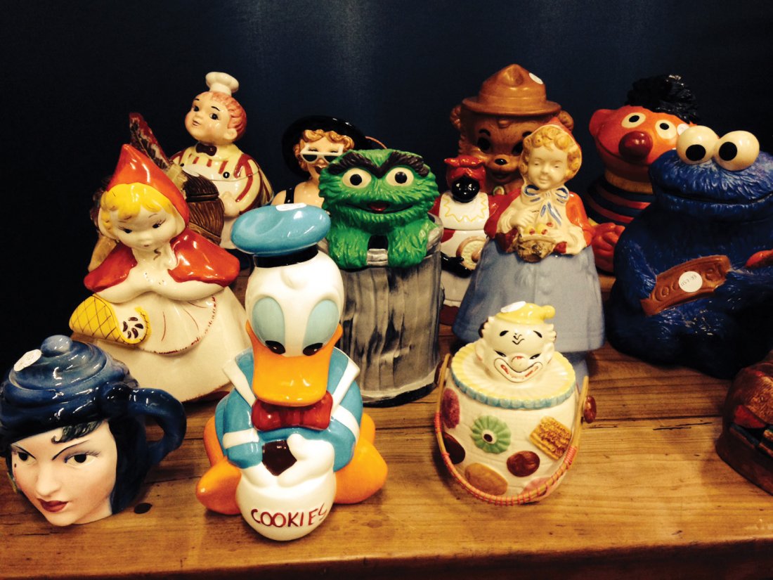 GROUP OF SIXTEEN ASSORTED COOKIE JARS: GROUP OF SIXTEEN ASSORTED COOKIE JARS, 20th Century, Including a McCoy Indian Chief, a Millennium limited edition Marilyn Monroe, a pair of clowns, a McCoy Little Red Riding Hood, three Sesame Street