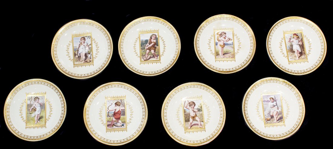 8-PC MINTON PORCELAIN CELADON GROUND PLATES: SET OF EIGHT MINTON PORCELAIN CELADON GROUND PLATES circa 1900, pattern G 5215, retailed by THEODORE B. STARR, NEW YORK, each painted with a central tablet depicting an allegorical child at play, high
