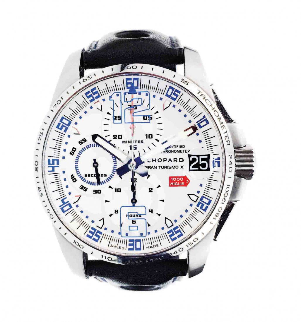 CHOPARD 'MILLE MIGLIA' TITANIUM GT XL WRISTWATCH: CHOPARD 'MILLE MIGLIA' TITANIUM GT XL WRISTWATCH Swiss, Automatic Mechanical Movement. Chronograph function with three sub-dials; seconds, minutes, and hours. Date at 3:00. Silver dial, with glare pro