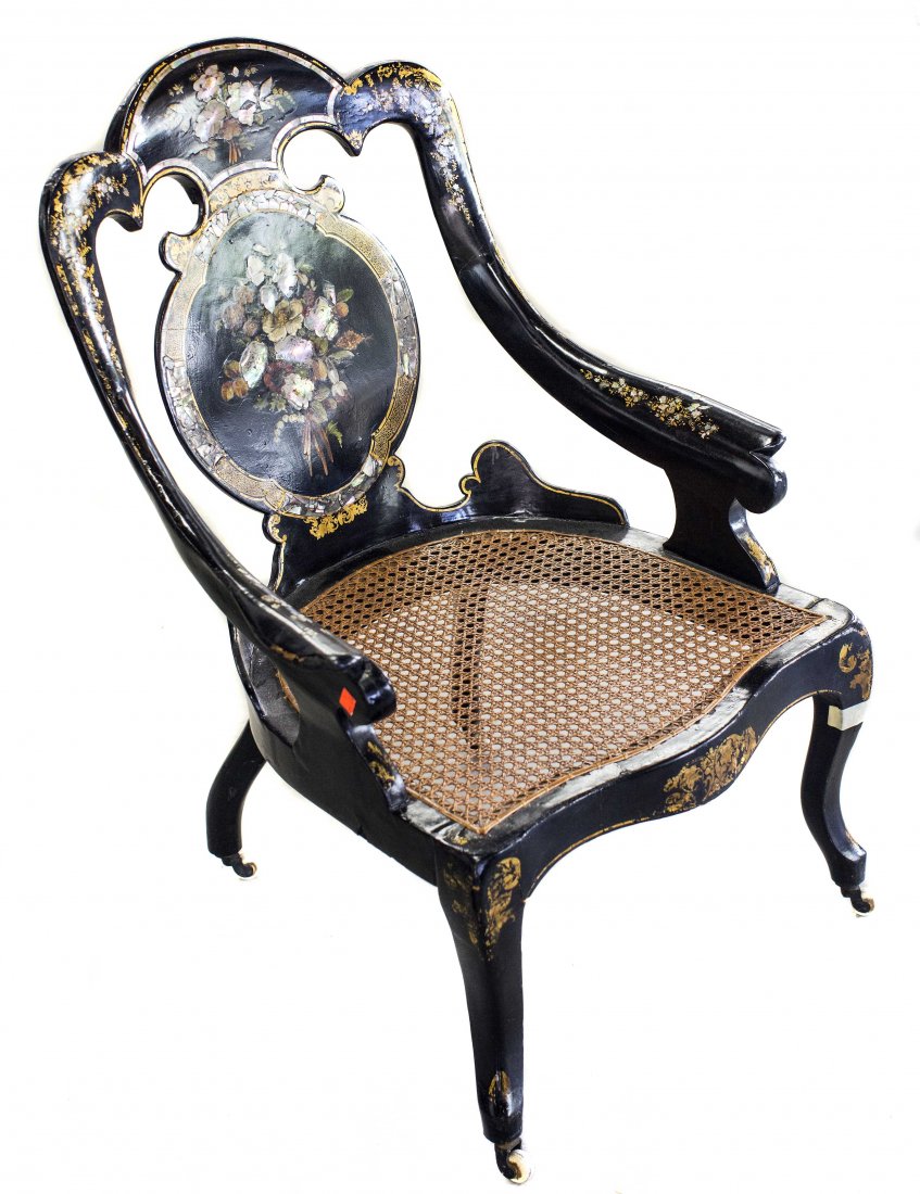 ENGLISH VICTORIAN PAINTED PAPIER MACHE CANED CHAIR: NO RESERVE - NO MINIMUM VICTORIAN FLORAL PAINTED AND EBONIZED PAPIER MACHE CANED CHAIR, circa 1860, English, shaped back with a painted floral bouquet, with down-swept arms, a caned seat on curved leg