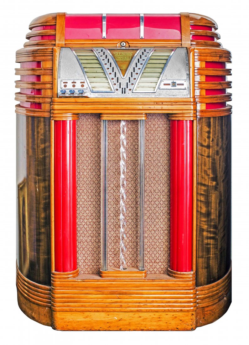 AMERICAN ART DECO COIN OPERATED SEEBURG JUKE BOX: AMERICAN ART DECO COIN OPERATED SEEBURG JUKE BOX Early 20th century. Seeburg Symphonola, J.P. Seeburg, Corp., Chicago. Of architectural form, with cherry red composition columns, lucite rods and chrom