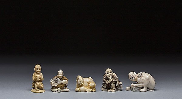 FIVE CARVED IVORY NETSUKE: FIVE CARVED IVORY NETSUKE The first netsuke of a "rat catcher," the second netsuke of a man on a lion, the third netsuke of a a seated man, the fourth netsuke of a man holding a dish, the fifth netsuk