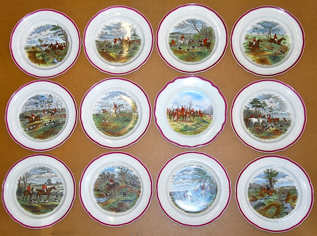 TWELVE ENGLISH COPELAND SPODE PORCELAIN HUNT PLATES: SET TWELVE ENGLISH COPELAND PORCELAIN SERVICE PLATESCirca 1900 Each with green printed maker's mark, each shaped circular plate painted with a central hunt scene. Diameter 10 1/2 in.