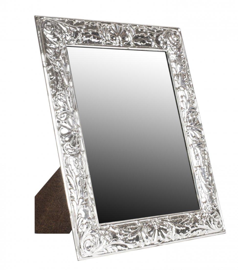 STERLING SILVER TABLE MIRROR: STERLING SILVER TABLE MIRROR Measuring 12 1/2 by 10 in.