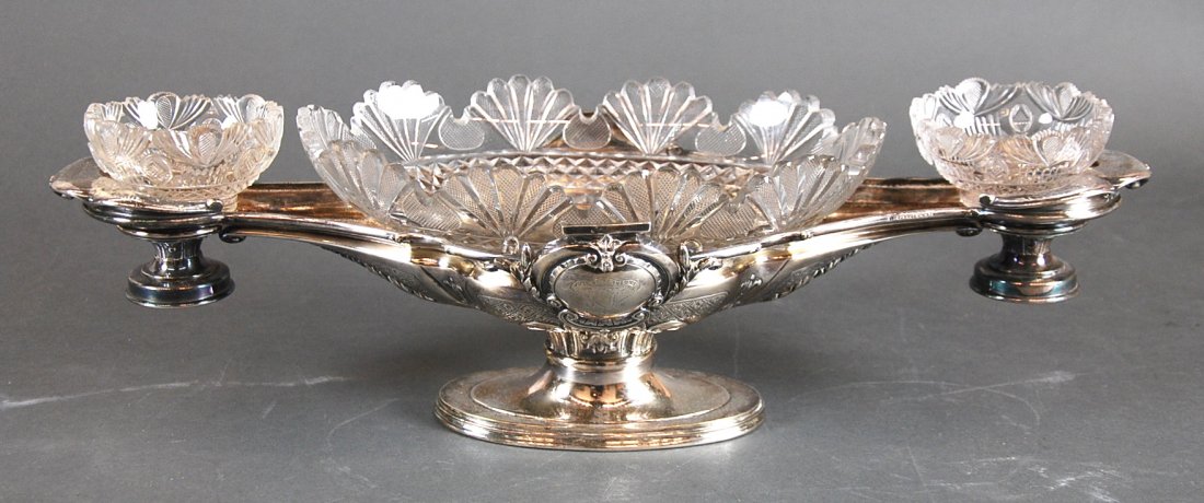 VICTORIAN SILVER PLATE NAVETTE-FORM EPERGNE: VICTORIAN SILVER PLATE NAVETTE-FORM EPERGNE, late 19th century, Elkington, marked, with associated glass fittings. Length 22 1/2 in.