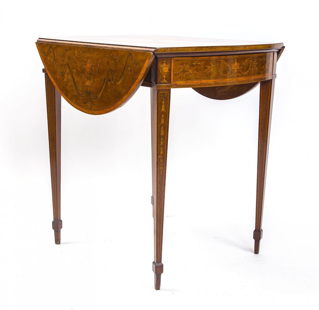 GEORGE III STYLE PEMBROKE TABLE, CIRCA 1890-1900: GEORGE III STYLE INLAID MAHOGANY AND SATINWOOD PEMBROKE TABLE Circa 1890-1900 Edwards & Roberts, the oval top elaborately inlaid with a patera, urns hung with garlands and banded borders; with curved 