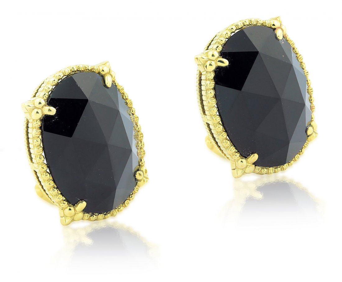 JUDITH RIPKA, PAIR OF 18 KARAT YELLOW GOLD EAR CLIPS: Set with two oval black onyx, signed Judith Ripka