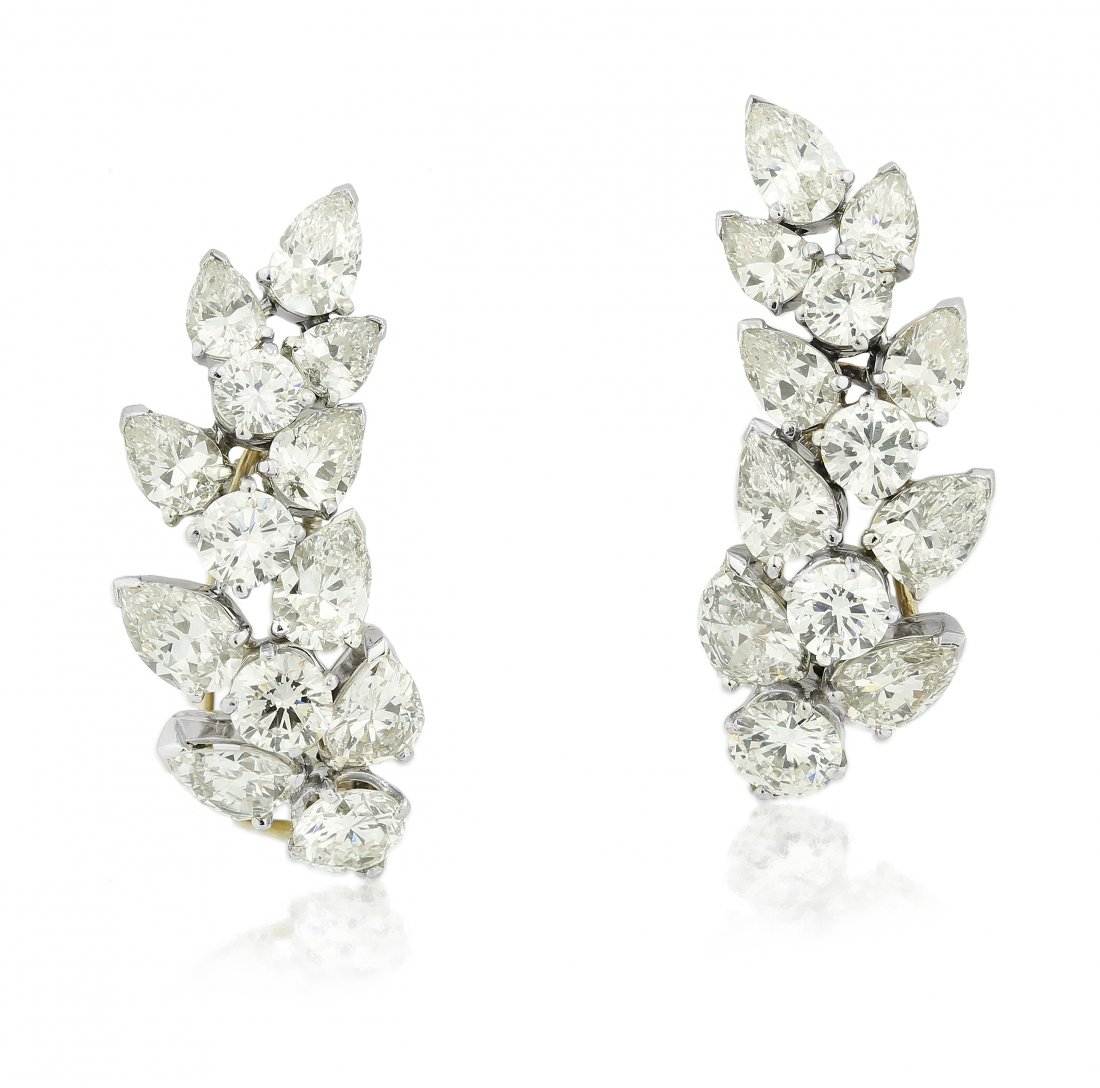 VAN CLEEF AND ARPELS, PAIR OF DIAMOND EARRINGS: Each of floral wreath design, set with brilliant-cut diamonds and pear shape diamonds weighing approximately 9.00 carats, can be converted to lapel pins, mounted in platinum and 18 karat white gold,�