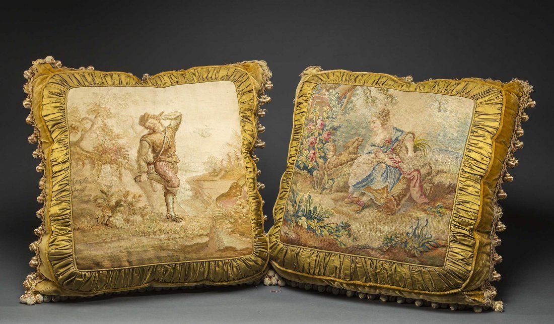 PAIR OF AUBUSSON PANELS, NOW FITTED AS PILLOWS: PAIR OF AUBUSSON PANELS, NOW FITTED AS PILLOWS The panels 18th/19th century, depicting either a woman seated before a tree or a hunter with bow and arrow; the pillows with a brown velvet backing and f