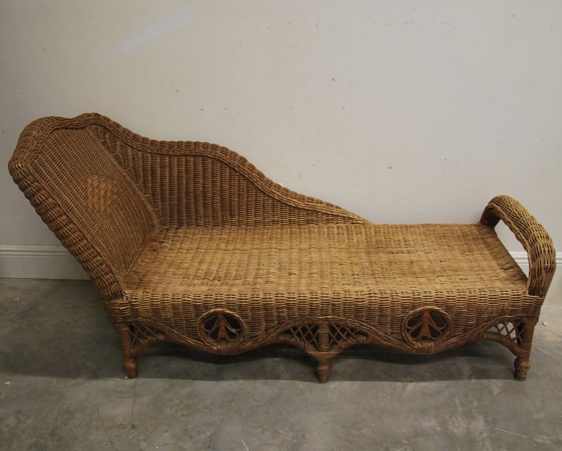 FRENCH WOVEN WICKER CHAISE LOUNGE, 1920-1930: FRENCH WOVEN WICKER CHAISE LOUNGE 1920-1930, with an arched back and straight legs. Length 66 in., Height 33 in., Depth 28 in.