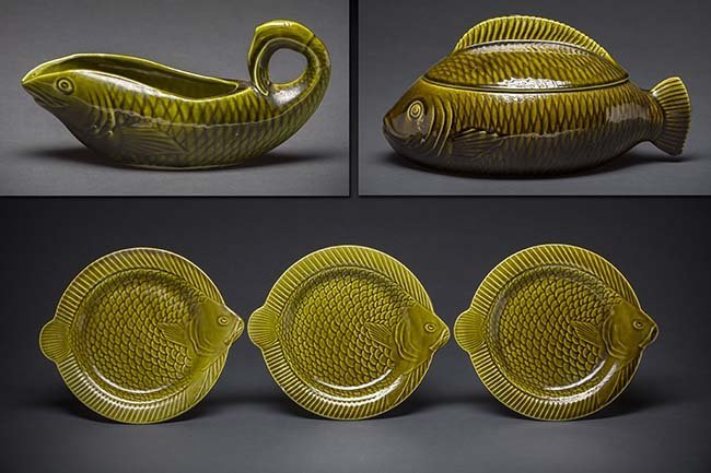 SARREGUEMINES GREEN GLAZED POTTERY PART FISH SERVICE: SARREGUEMINES GREEN-GLAZED POTTERY PART FISH SERVICE, circa 1930-1940, each in the form of a fish, comprising of: a covered soup tureen, a sauce boat, a platter, and three fish-form plates, the unders