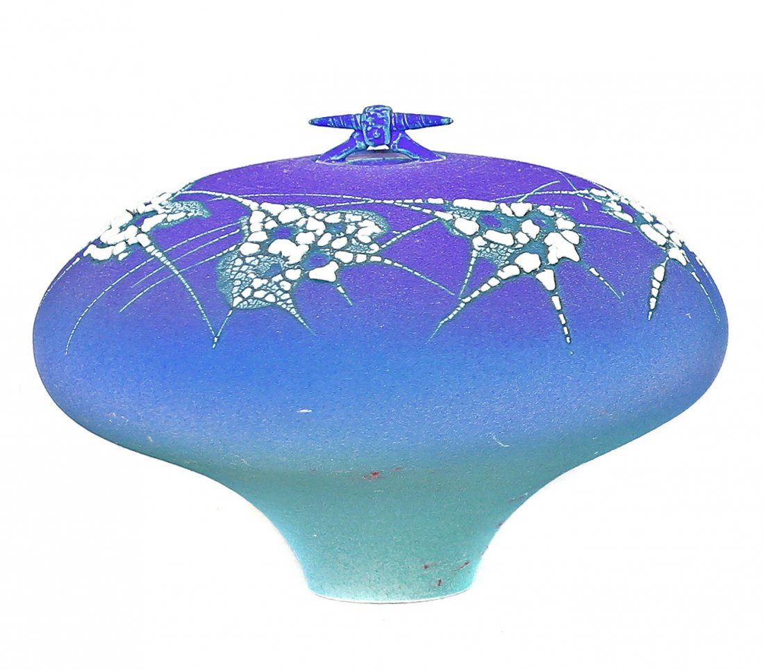 CONTEMPORARY TEXTURED CERAMIC LIDDED VASE: PROPERTY FROM A PALM BEACH, FL. AND GREENWICH, CT. COLLECTORPROPERTY FROM THE CONTEMPORARY TEXTURED CERAMIC LIDDED VASE unsigned, the compressed spherical body on a tall cylindrical tapered foot, deco