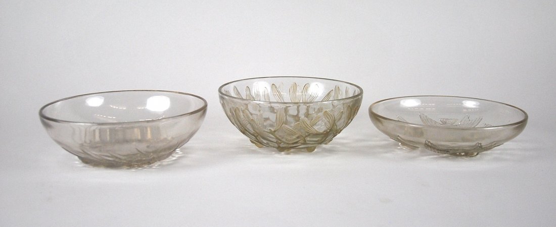 RENE LALIQUE 'UNTITLED' 'NONNETTES' 'MONT-DORE'c.1920's: RENE LALIQUE 'UNTITLED' A clear and frosted glass coupe, model introduced 1920's 8 in.(20 cm.) diameter inscribed R. LALIQUE FRANCE 'NONNETTES' A clear and frosted glass coupe, model introduced 1928 M