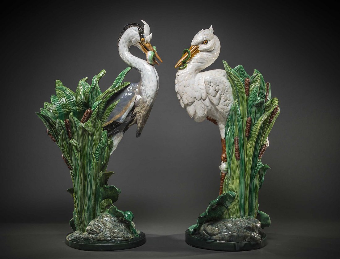 NEAR PR MINTON MAJOLICA STICK STANDS, P. COMOLERA: NEAR PAIR OF FINE MINTON MAJOLICA HERON STICK STANDS, MODELED BY PAUL COMOLERA, 1875 to 1895, the underside of each with varied cyphers and indistinct date letter for Minton, each heron naturalistical
