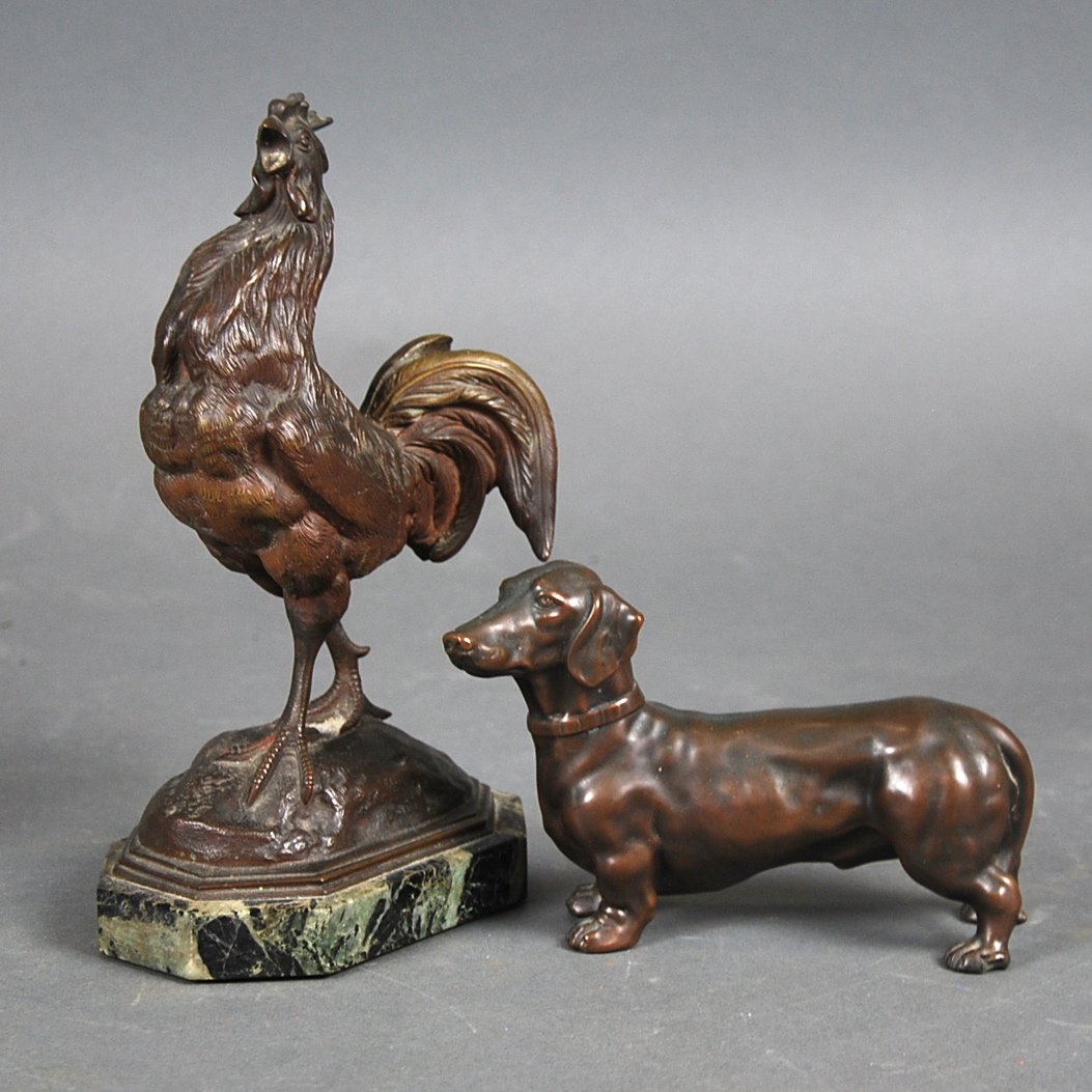 FRENCH PATINATED BRONZE ROOSTER AND METAL DACHSHUND: FRENCH PATINATED BRONZE ROOSTER AND A PATINATED METAL DACHSHUND The first, circa 1900, unsigned, standing upon a mound, on a shaped Verde Antico marble base, the second together with a patinated metal