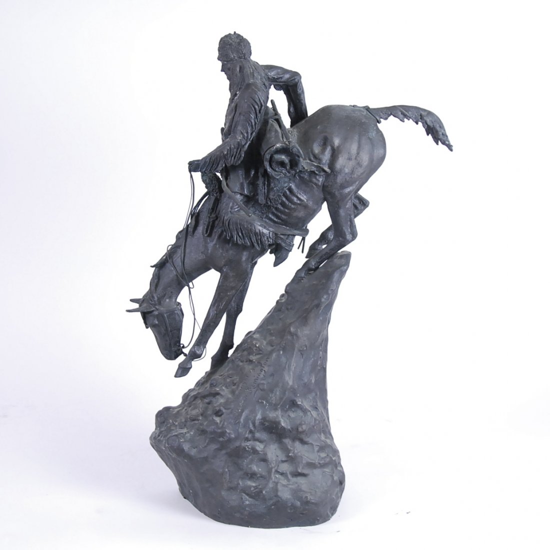 AFTER FREDERICK REMINGTON,(AMER) , "MOUNTAIN MAN", 20TH: AFTER FREDERICK REMINGTON, (American, 1861-1909) "The Mountain Man" bearing the inscription, 'Copyright by/Frederic Remington' (running vertically along the side of the mound, also bearing along the b