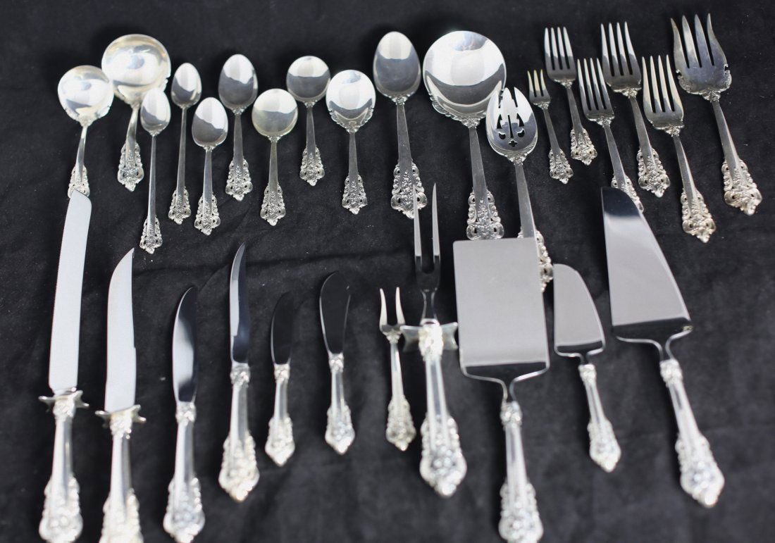 251 PIECE GRAND BAROQUE SILVER FLATWARE SET: 251 PIECE GRAND BAROQUE SILVER FLATWARE SET. Introduced in 1941, Maker: Wallace Silversmiths. Comprising: 20 Steak knives 19 forks 20 Seafood forks 20 Soup spoons 20 Bouillon spoons 20 Coffee / Tea sp