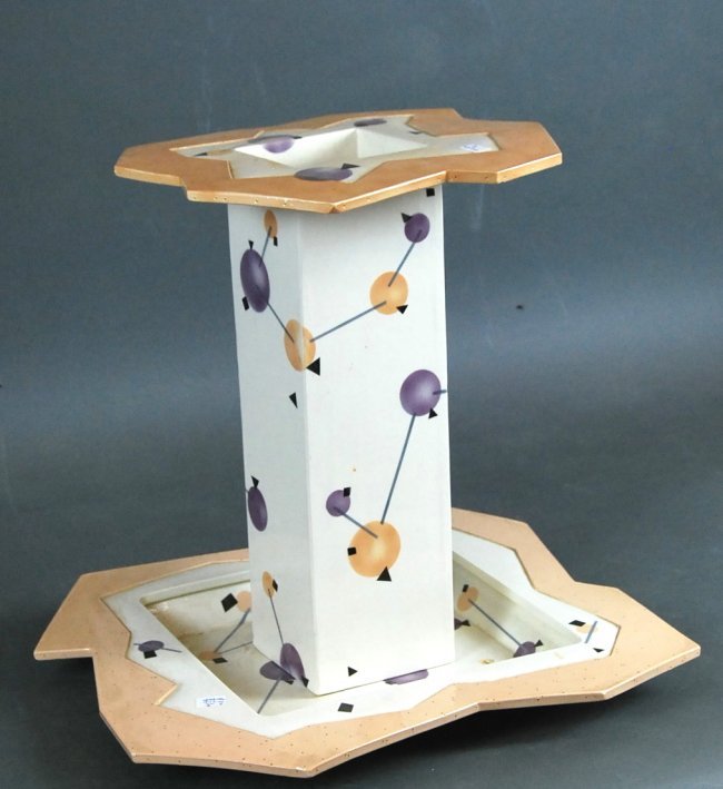 RITA DUVALL, FINE POST MODERN CERAMIC VASE AND UNDER PL: RITA DUVALL, FINE POST MODERN CERAMIC VASE AND UNDER PLATE signed on the underside and dated 1982 (vase) 1983 (plate) the vase of tall square form with a flared and shaped rim, the under plate with a